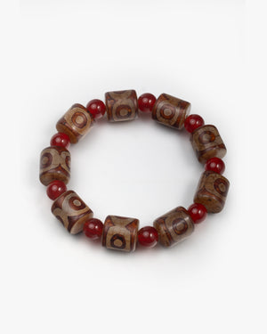 Multi Three Eye Dzi Bead Bracelet In Cylinder-Cut Tibetan Agate