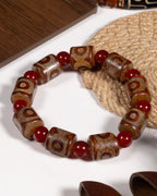 Multi Three Eye Dzi Bead Bracelet In Cylinder-Cut Tibetan Agate