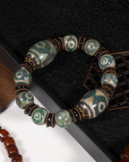 Three Eye Dzi Bead Bracelet In Natural Tibetan Agate With Lotus Spacer