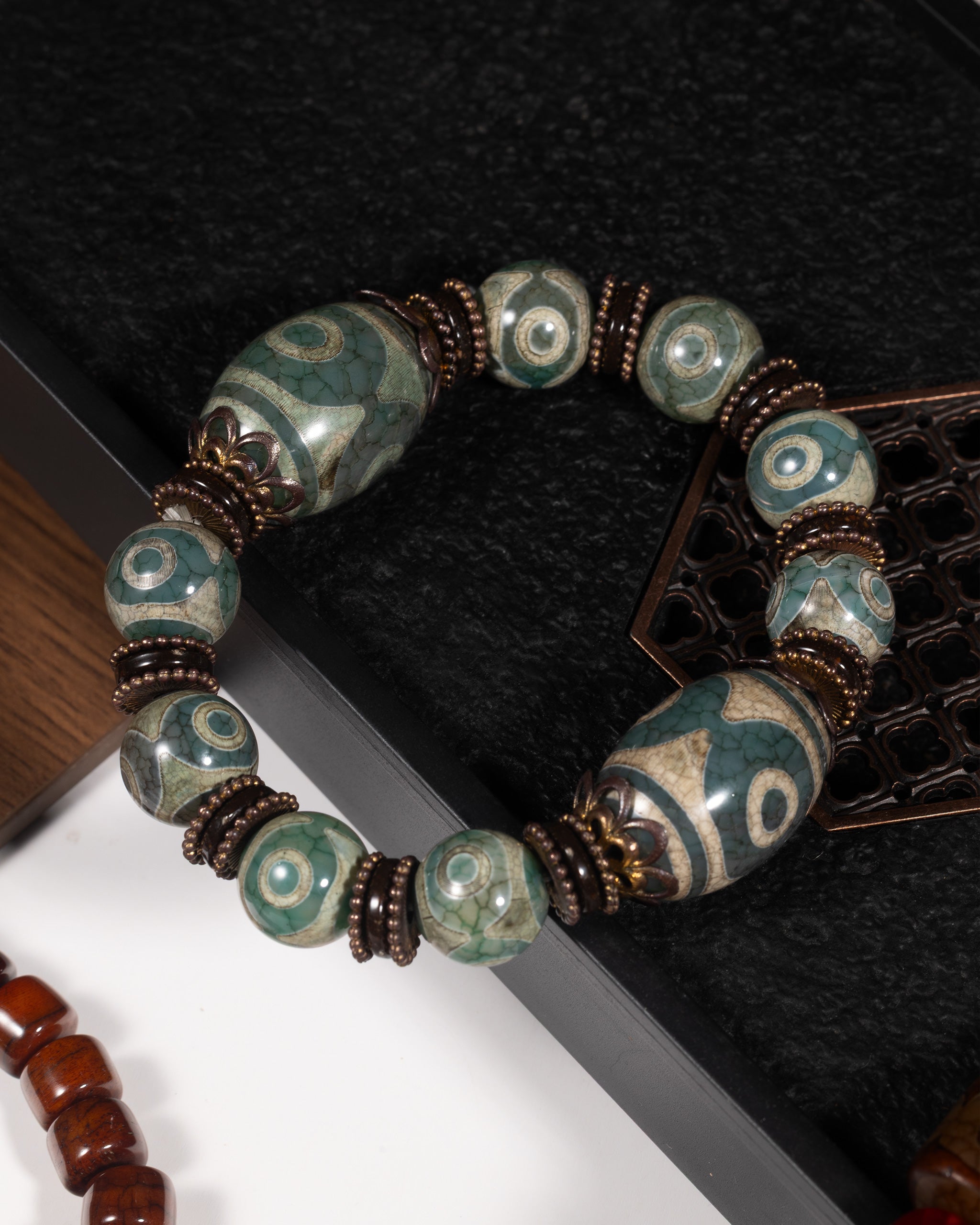 Three Eye Dzi Bead Bracelet In Natural Tibetan Agate With Lotus Spacer